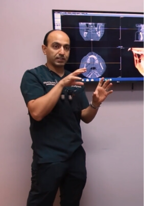 Doctor Modarres presenting patient treatment in consultation room