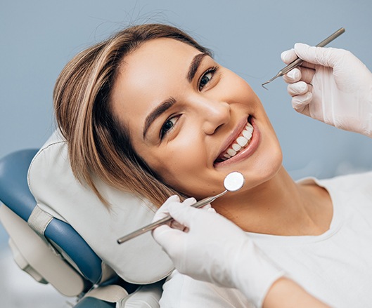 Woman smiling in dental chair