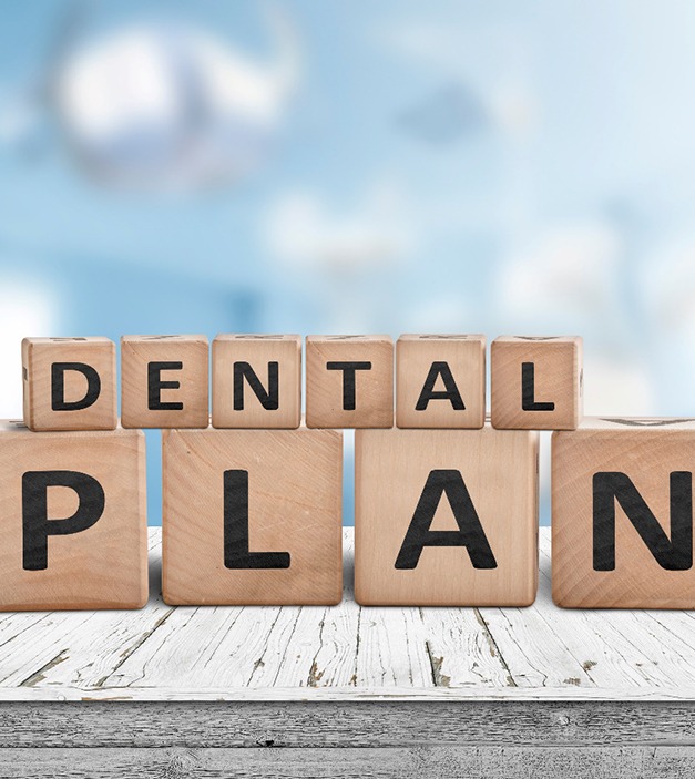 blocks spelling out dental plan