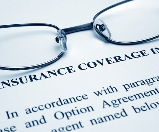dental insurance form with glasses