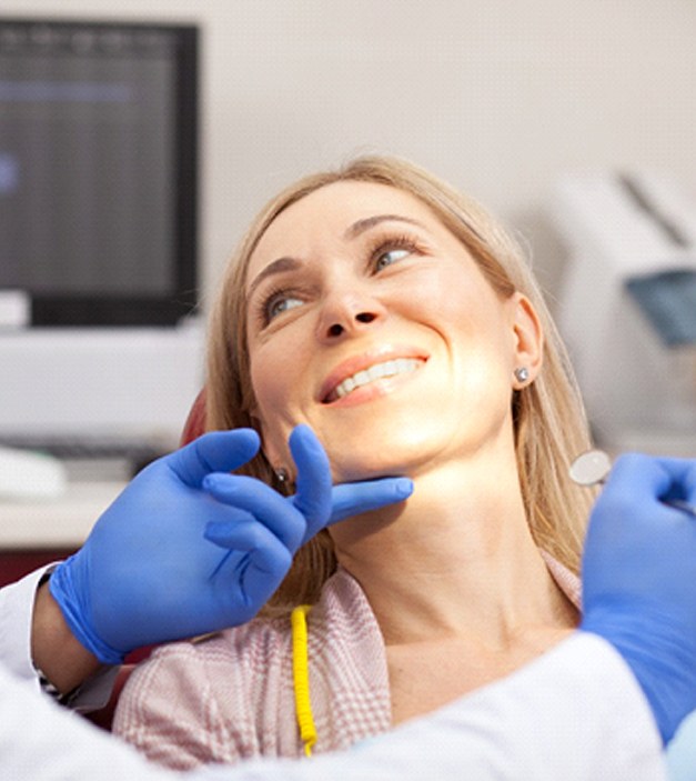 Woman at cosmetic dentist in Ellicott City.