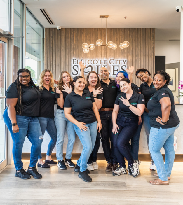Man and woman smiling together after restorative dentistry