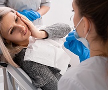Lady has oral pain