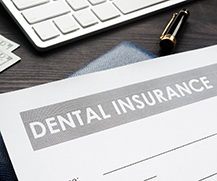 Dental insurance form resting on a table