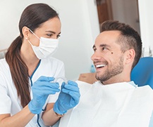 patient talking to his Invisalign dentist in Ellicott City 