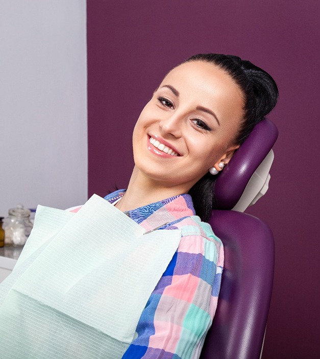 Smiling, relaxed dental patient thanks to IV sedation Ellicott City