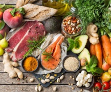 A selection of healthy foods against a rustic wooden background
