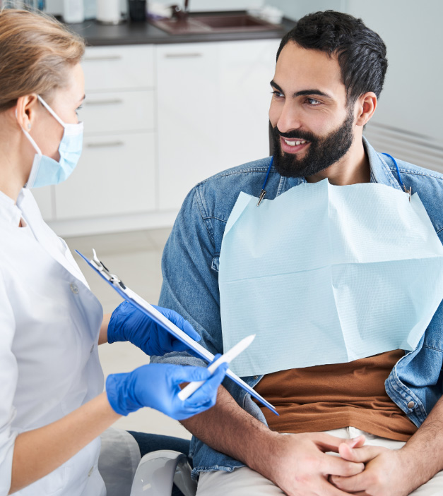 patient talking with dentist