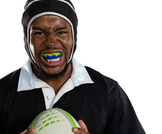 Rugby player wearing mouthguard in Ellicott City