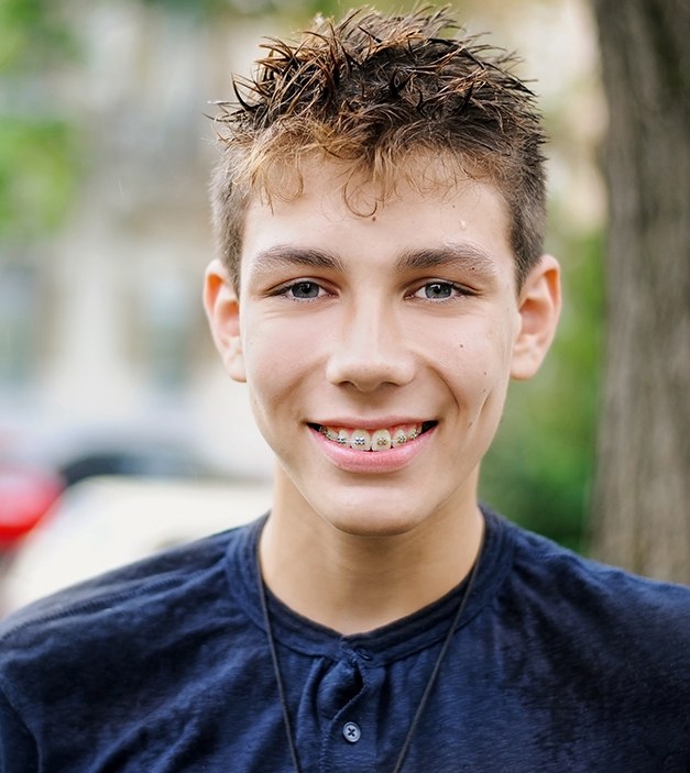 Teen boy with braces