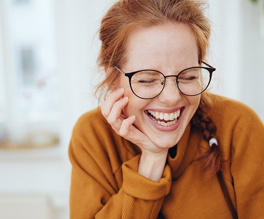 young woman smiling and laughing