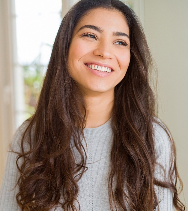 Closeup of woman smiling at home
