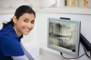 dentist smiling at the camera