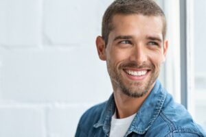 Man feeling confident after his smile makeover